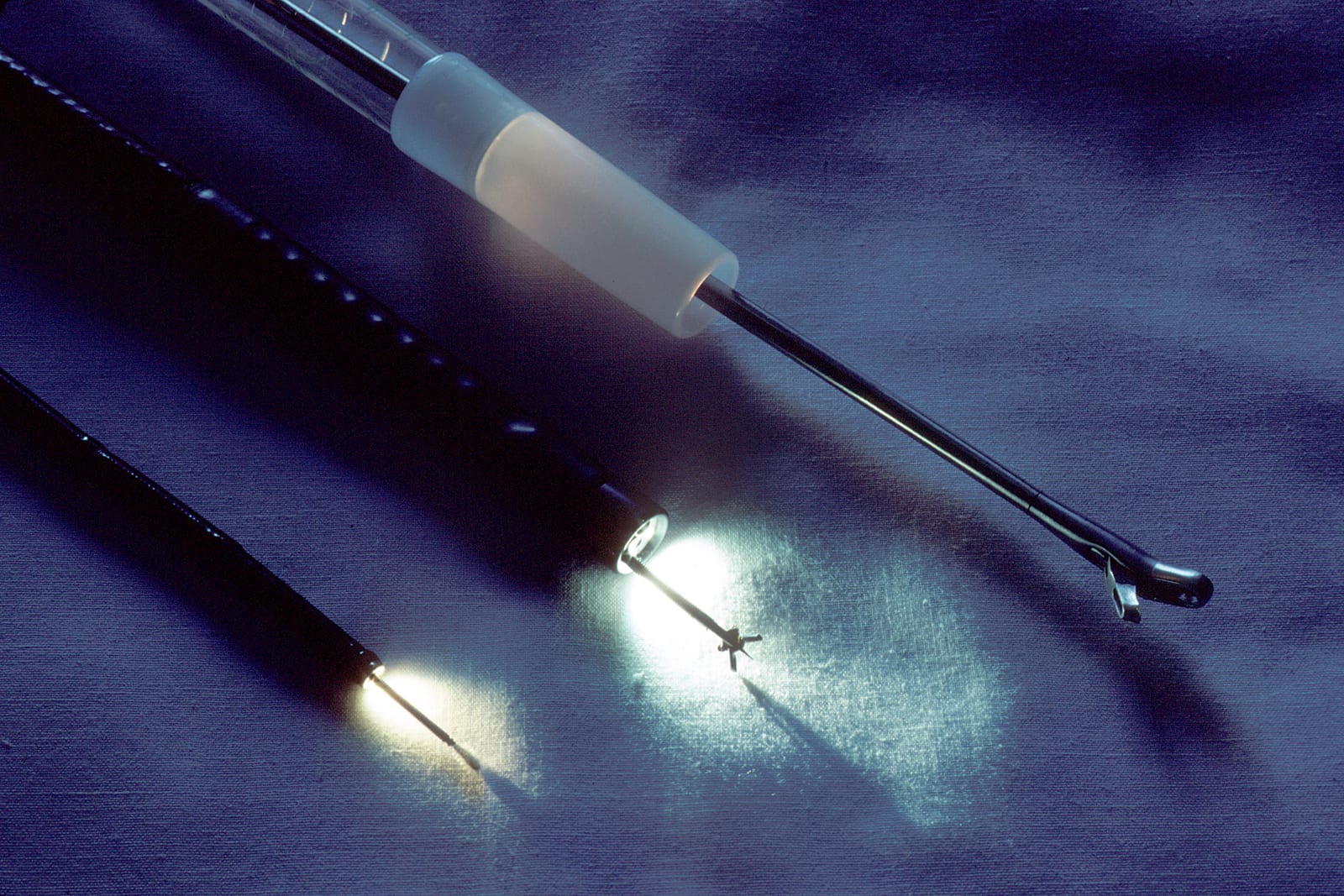 Used ENT endoscopy instruments and a rigid scope staged as-is for pickup