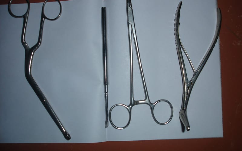 Nasal and sinus surgical instruments — an angled through-cutting nasal forceps, a straight osteotome and hemostat, and a bayonet nasal cutting forceps