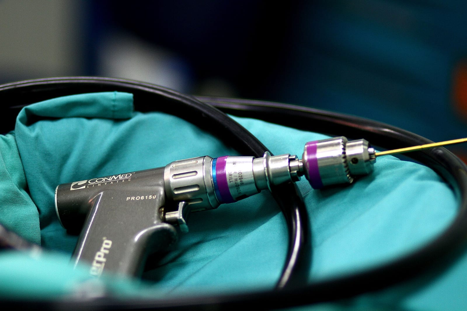 Surgical power drill handpiece with attachments