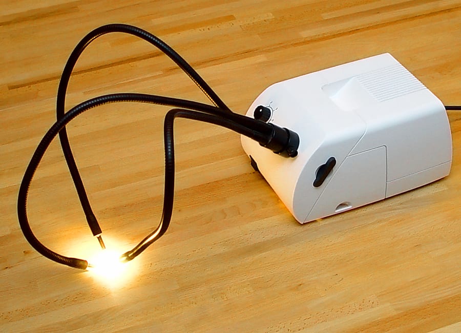 Fiber-optic cold light source unit with an illuminated dual light guide