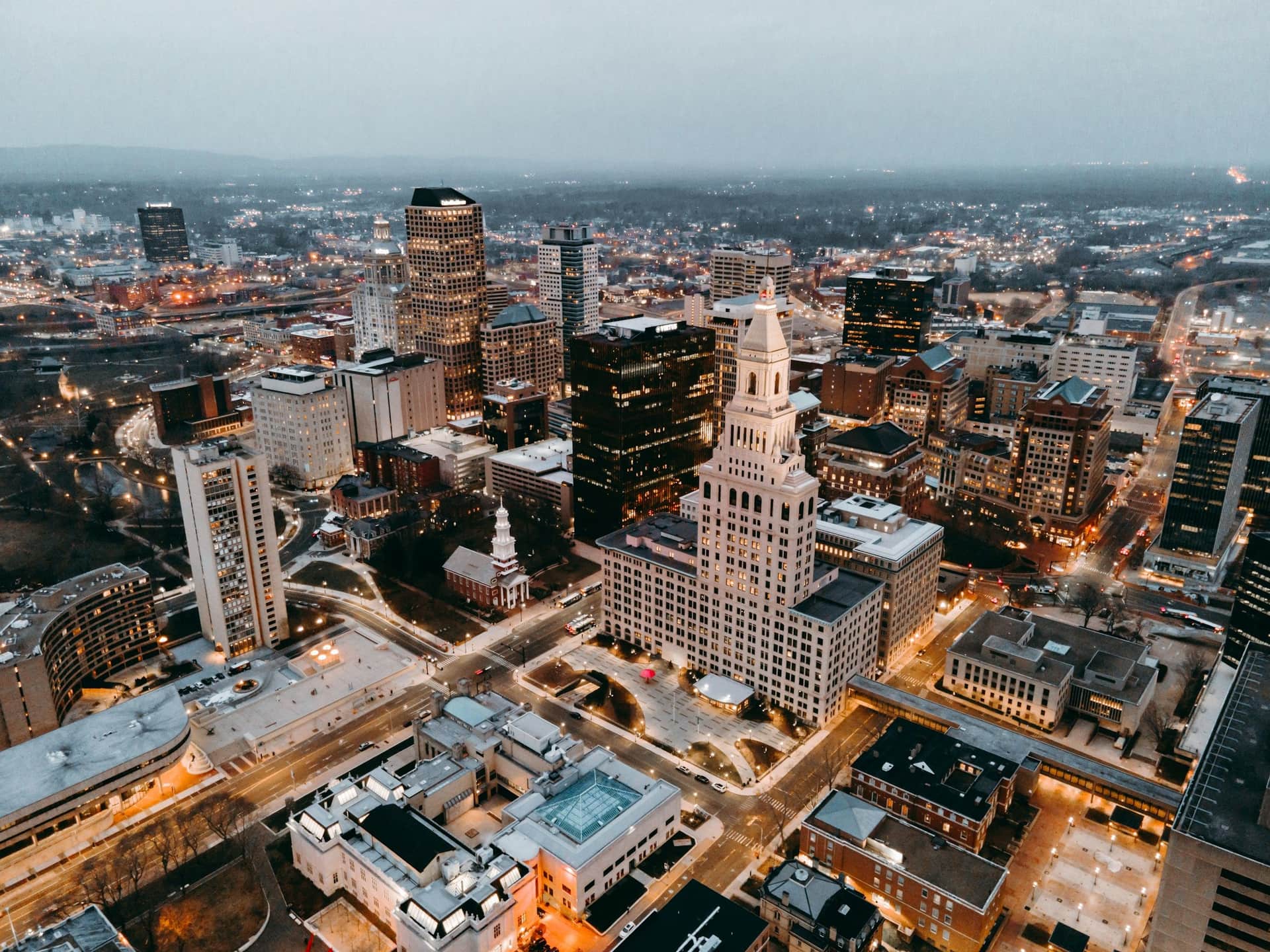 Aerial view of downtown Hartford at dusk with the Travelers Tower, Connecticut