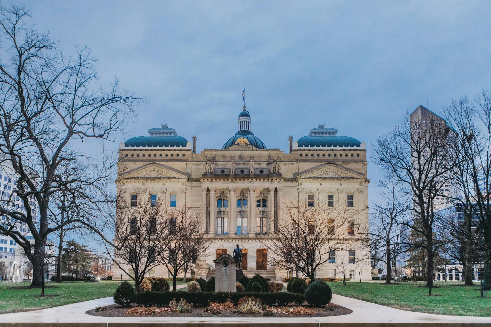 Indiana Statehouse framed by bare winter trees, Indianapolis, Indiana
