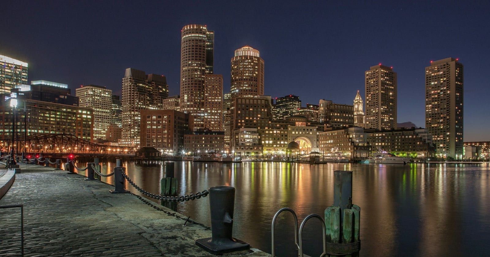 Boston's Financial District and Rowes Wharf across Fort Point Channel before dawn, Massachusetts