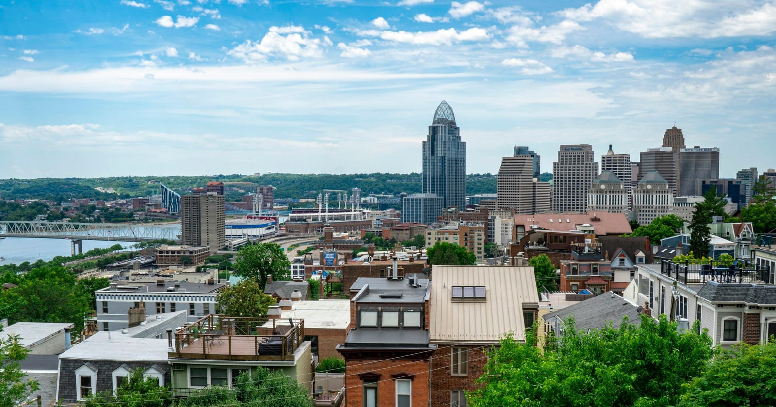 Downtown Cincinnati and the Ohio River seen over hillside rowhouses, Ohio