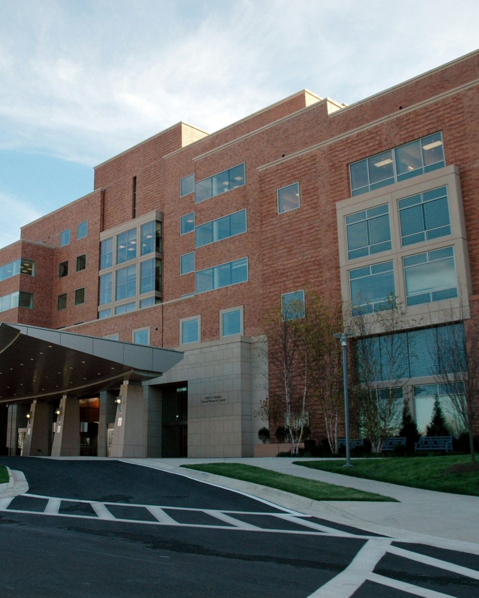 Entrance and drop-off canopy of a multi-story medical building